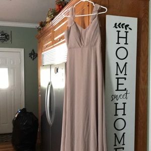 Formal dress in good condition ware once for a wedding the color is Champagne